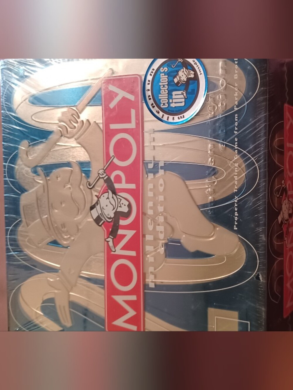 Hasbro Monopoly Tin Edition in Blue, Red, Silver